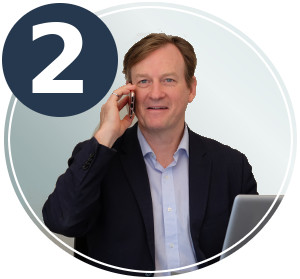 Leader in phone meeting with New Avenue Leadership happy leader speaking to Mara Vizzutti of New Avenue Leadership on the phone